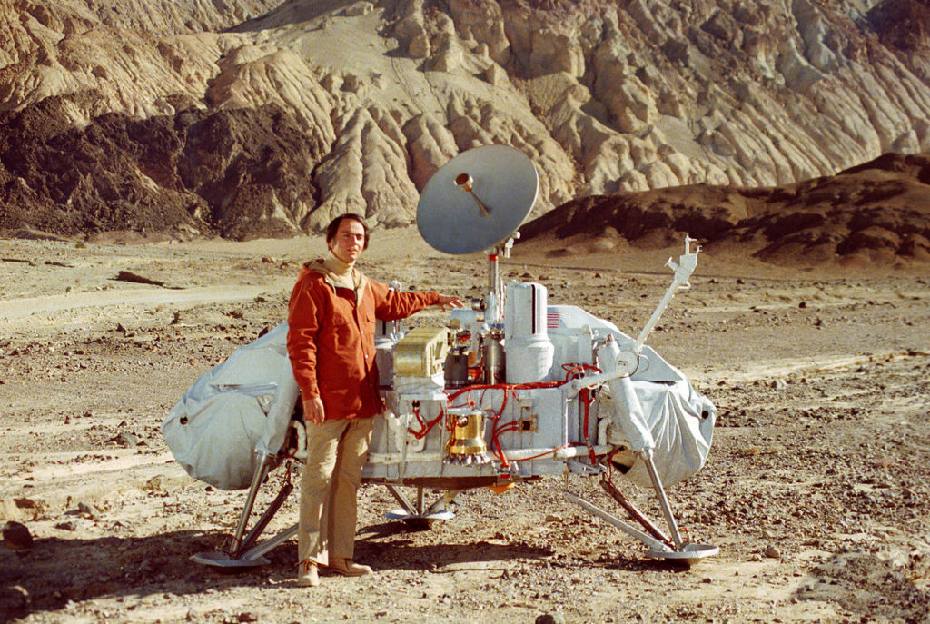 Carl Sagan Standing Next to a Model of a Viking Lander