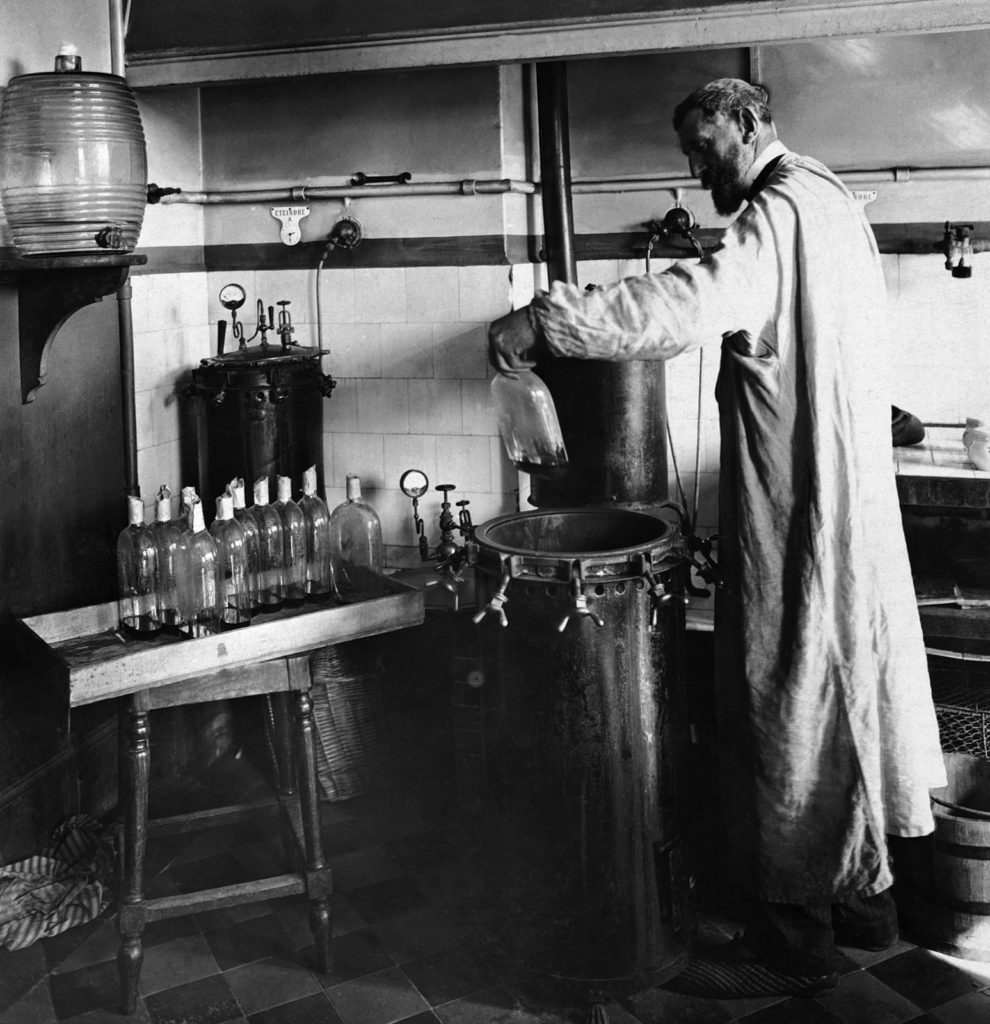 Louis Pasteur performing an experiment